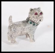 A sterling silver cast figurine of a terrier dog h