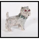 A sterling silver cast figurine of a terrier dog h