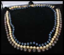 A group of three freshwater pearl necklace strands