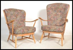 A pair of mid 20th Century Ercol light beech and e