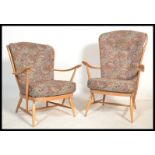 A pair of mid 20th Century Ercol light beech and e