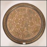 A large 19th century Indian brass and copper wall