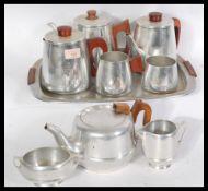 Two sets of vintage 20th century retro stainless s