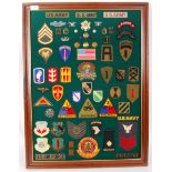 ASSORTED U.S ARMY PATCHES AND CAP BADGES