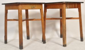 A pair of vintage 20th century wooden pub tables o