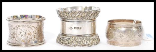 A group of three silver hallmarked napkin rings to
