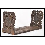 A 19th century Indian anglo colonial carved wooden