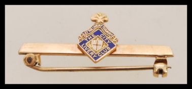 A gents vintage 9ct gold / 375 marked enamel brooc