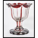 A 19th century Bohemian glass goblet vase having a