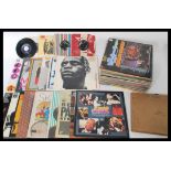 A collection of long play LP vinyl albums featurin