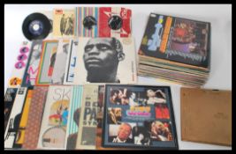 A collection of long play LP vinyl albums featurin