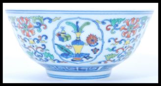 A 19th century Chinese bowl having hand painted fi