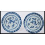 A pair of 19th century Chinese blue and white hand