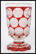 A 19th century Bohemian glass goblet vase raised o