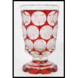 A 19th century Bohemian glass goblet vase raised o