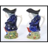 A pair of 19th century Victorian Staffordshire Tob