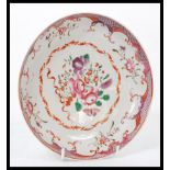 An 18th century Chinese famille rose plate hand pa