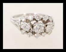 A fantastic 18ct white gold thirteen stone diamond