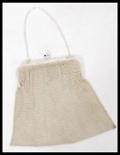 A Sterling 935 silver ladies mesh purse with chase