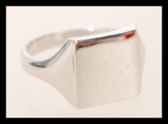 A 9ct white gold gents vintage signet ring being h