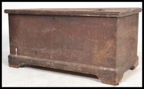 A large Victorian pine blanket box having a plinth