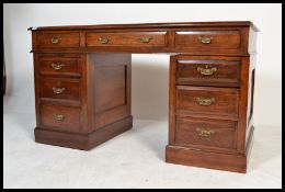 A 19th century Victorian walnut twin pedestal writ