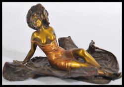 A 20th century cold painted bronze figurine sculpt