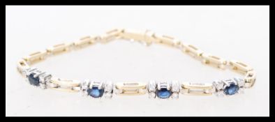 A contemporary box chain ladies bracelet with 4 sa