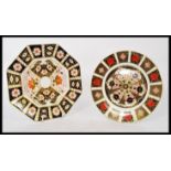 A pair of Royal Crown cabinet plates in the Imari