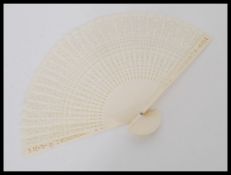 A vintage early 20th century Chinese bone hand fan