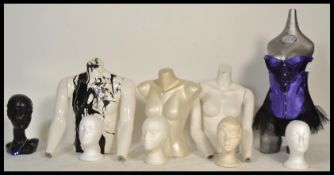 A collection of vintage male and female torso mann