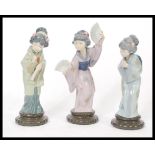 A group of three pieces of Lladro porcelain figure