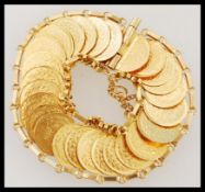 A high carat / 22ct gold Saudi Arabian coin bracel