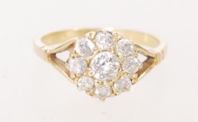 An 18ct gold diamond cluster ring with central dia