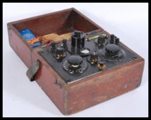 A vintage 20th century 1940's Cambridge portable potentiometer resistance tester in a wooden case