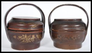 A pair of 19th century small Chinese boxes of wooden construction with painted decoration and shaped