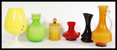 A collection of Italian Murano 1960's vintage retro coloured studio glass vessels to include an acid