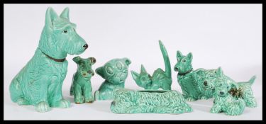 A collection of vintage 20th century SylvaC green ceramics to include a dog form planter, a large