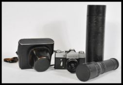 A vintage Zenit-B camera having an Industar 50-2 lens and a cased Dufay no45055 lens. Complete in
