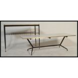 A vintage mid 20th Century ebonised  metal tubular framed atomic coffee table together with a