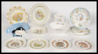 A collection of 20th century Royal Doulton ceramics to include a Snowman Party Time teacup and