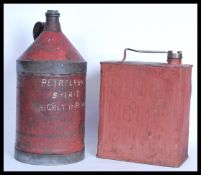 A vintage early 20th Century Shell petrol can, notation to front with original cap together with a