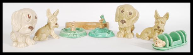 A mixed collection of vintage 20th century SylvaC ceramic figurines to include a dog and pond form