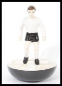 A Royal Doulton Subbuteo ceramic football figurine