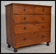 A Victorian mahogany chest of drawers having 2 short over 3 deep drawer configuration with oval