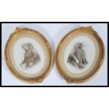 A pair of early 20th century portrait marital photographs of an Edwardian couple in gilt oval frames