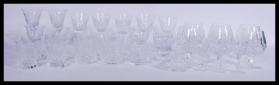 A collection of 20th Century  Waterford Crystal cut glass glasses with most being signed including