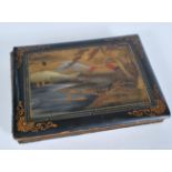 A vintage early 20th century lacquered postcard album containing a good group of postcards of Japan,
