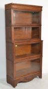 A vintage 20th Century Edwardian oak sectional lawyers / barristers bookcase in the manner of