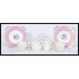 A 20th century Wedgwood s123 breakfast tea set in a chintz pattern comprising of two cups and